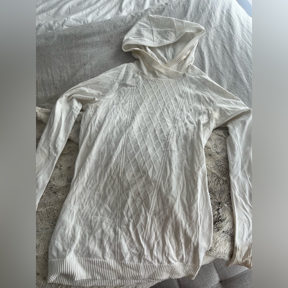 White hooded Lululemon long sleeve top